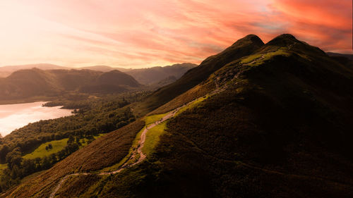 Scenic view of mountains against sky during sunset