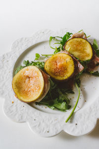Close-up of burger in plate on table