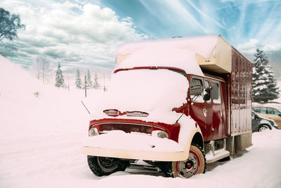 Car on snow covered landscape