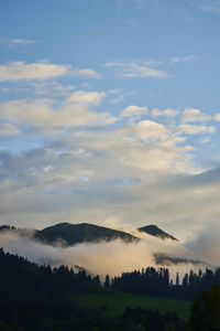 Scenic view of mountains against sky during sunset