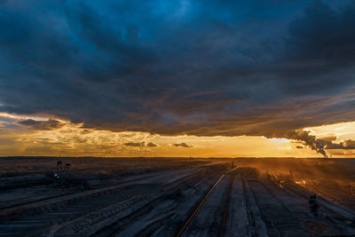 Storm clouds over hambach opencast mine, germany.