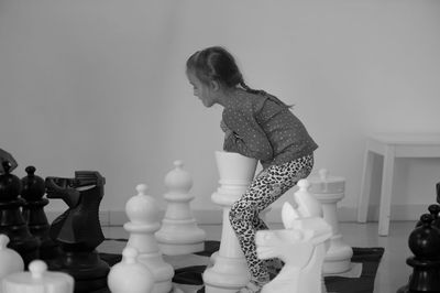 Big size chess stage for children and young girl playing