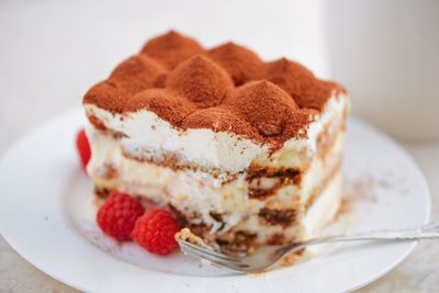 Close-up of tiramisu fork in plate