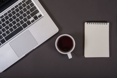 High angle view of coffee cup on table