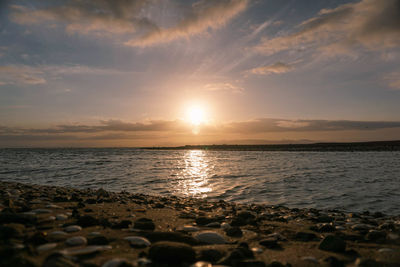 Scenic view of sea against sky during sunset