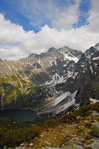 Scenic view of snowcapped mountains against sky