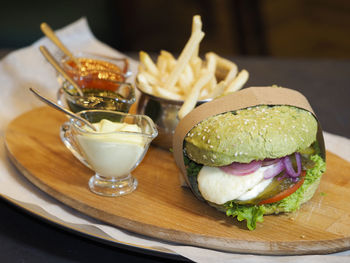 Close-up of burger in plate on table