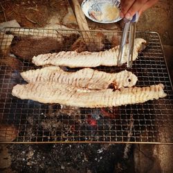 Close-up of meat on barbecue grill