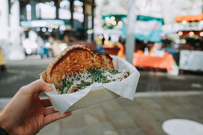 Close-up of hand holding food