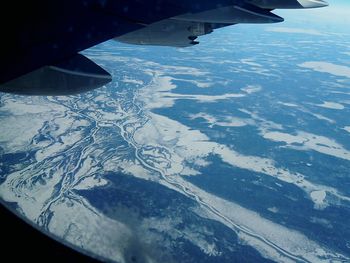 Aerial view of snow covered landscape