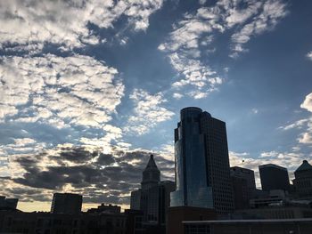 Low angle view of buildings against sky in city