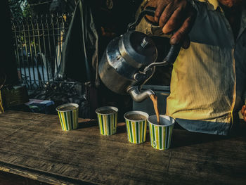 Man working with tea