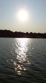 Scenic view of sunset over lake