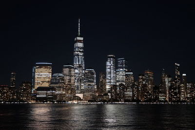 Illuminated buildings in city at night