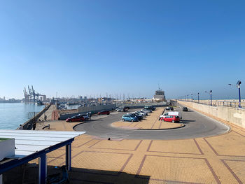 View of city by sea against clear sky