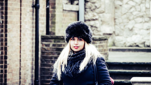 Portrait of young woman outdoors