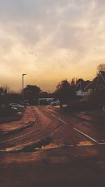 Road against sky during sunset