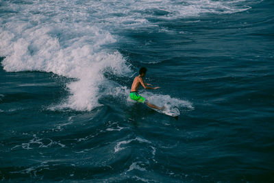 Man surfing in sea