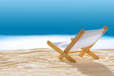 Close-up of umbrella on beach