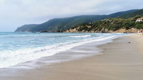 Scenic view of beach against sky