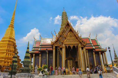 Group of people in temple against building