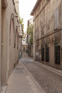 Street amidst residential buildings