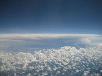 Aerial view of clouds against blue sky