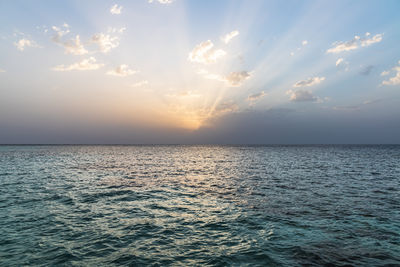 Scenic view of sea against sky during dawn