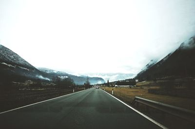 Road against sky during winter