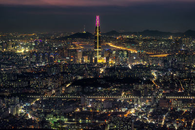 High angle view of illuminated city at night