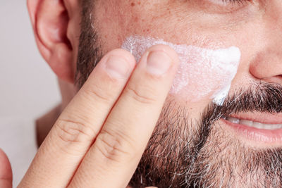 Close-up of man with face paint