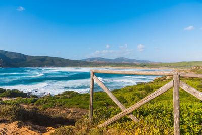 Scenic view of sea against blue sky