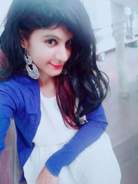 Portrait of smiling young woman