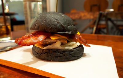 Close-up of burger in tray on table