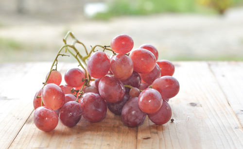 Close-up of grapes on table