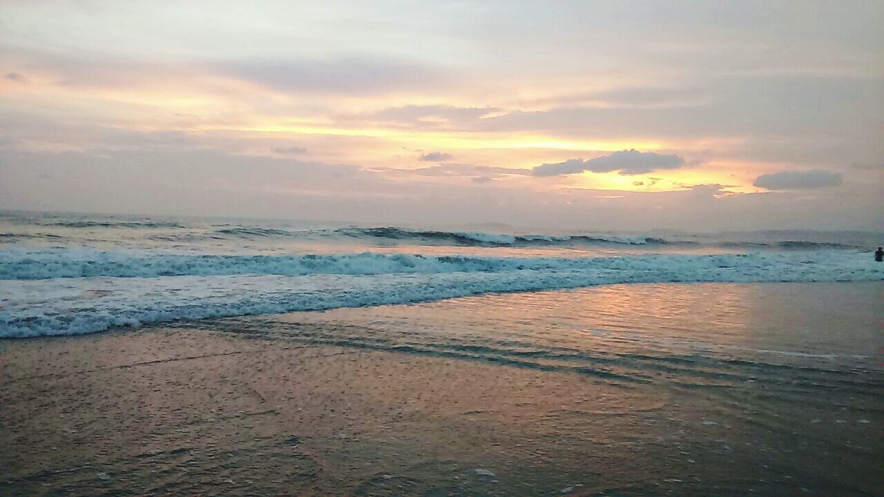 sea, horizon over water, beach, water, sky, scenics, shore, tranquil scene, tranquility, beauty in nature, sunset, sand, cloud - sky, nature, idyllic, wave, coastline, cloud, outdoors, cloudy