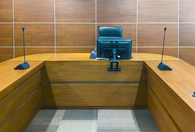 Empty view of the front side in the meeting room with the monitor on the chairman.