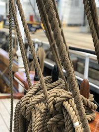 Close-up of rope tied on wood