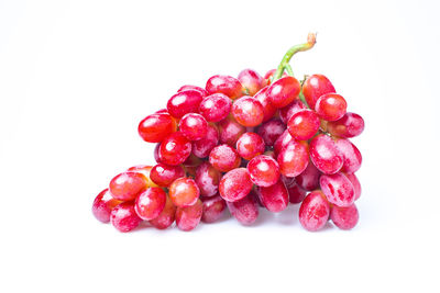 Close-up of raspberries against white background