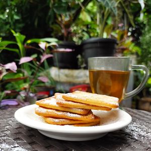 Close-up of food served on table