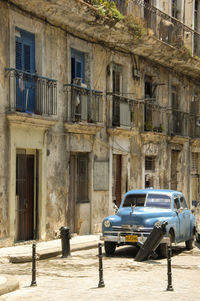 Car in front of building