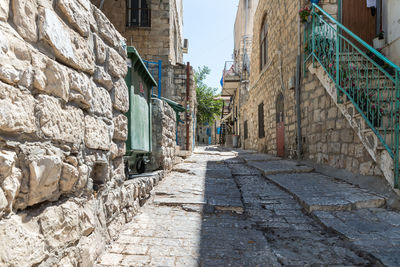 Narrow alley along buildings