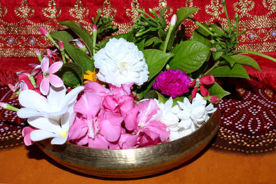 High angle view of pink roses on table