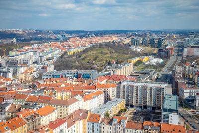 High angle view of buildings in city against sky