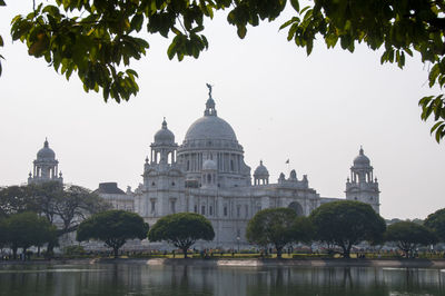 The victoria memorial is a large marble building in kolkata, west bengal, india.