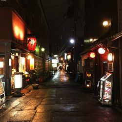 Illuminated street lights at night