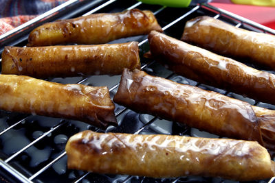 Close-up of meat on barbecue grill