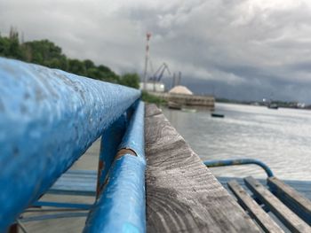 Close-up of metallic railing against don river