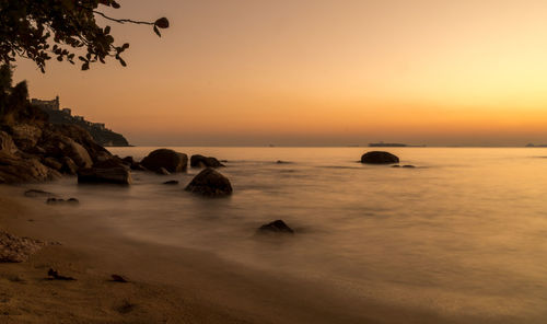 Scenic view of sea against sky during sunset