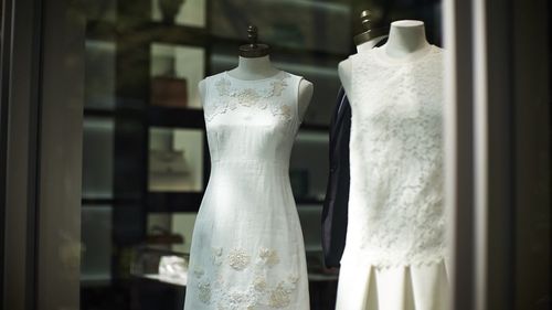 Close-up of mannequin on white wall